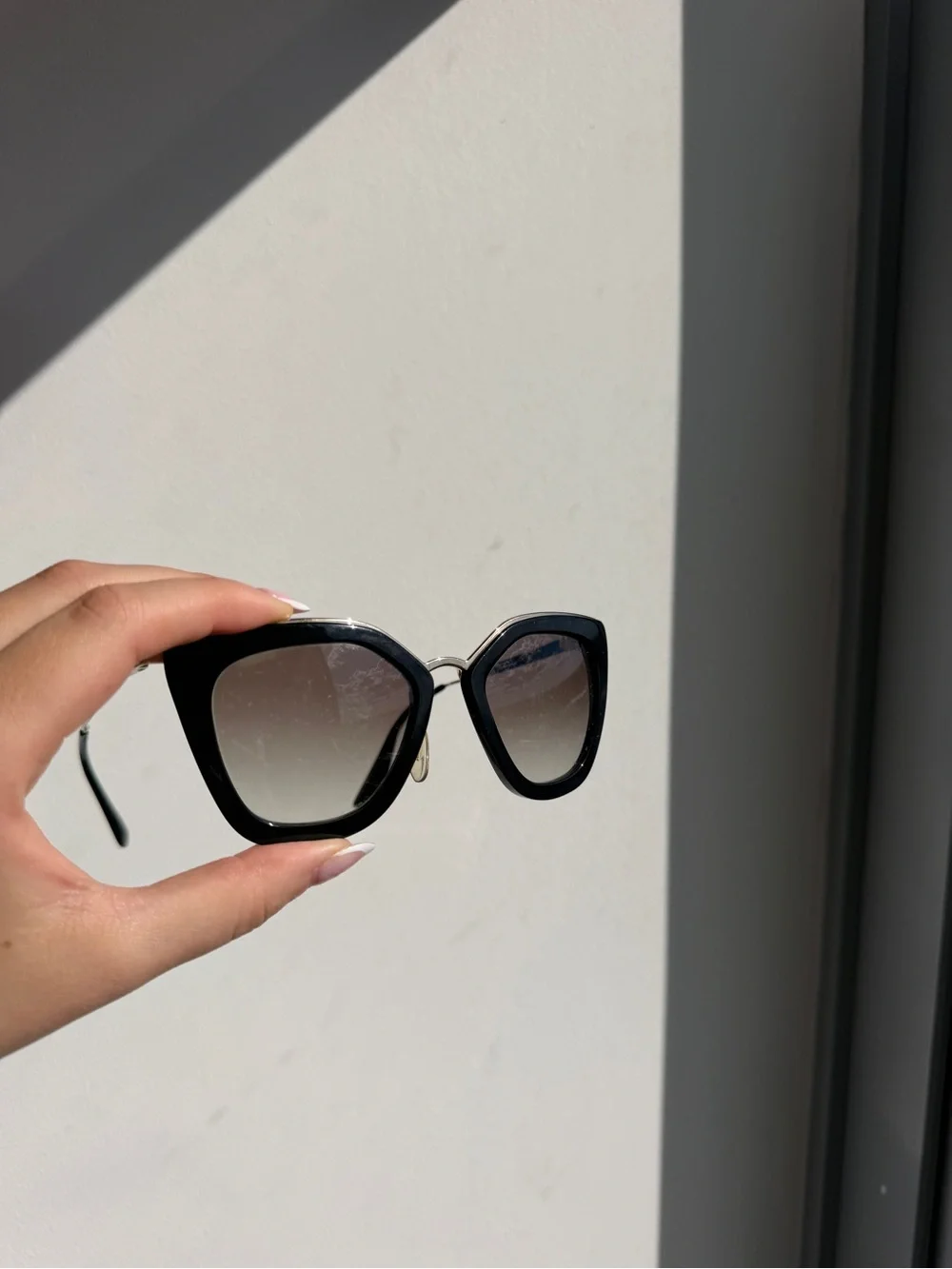 Prada Black Cat-Eye Sunglasses with Gradient Lenses